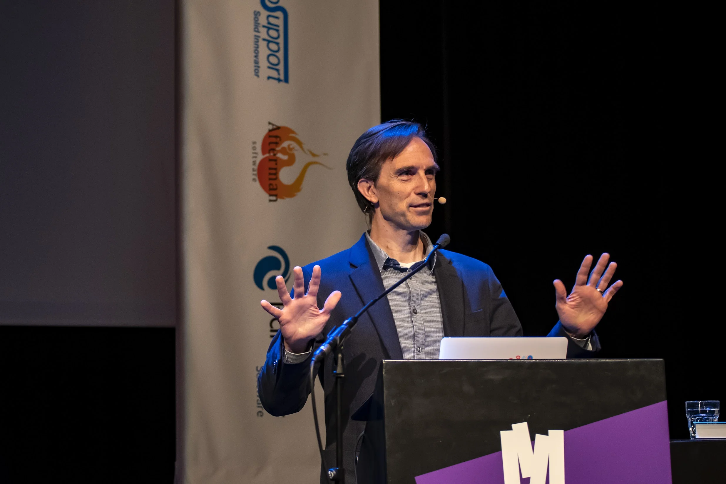 Paul Rayner speaking at DDD Europe conference